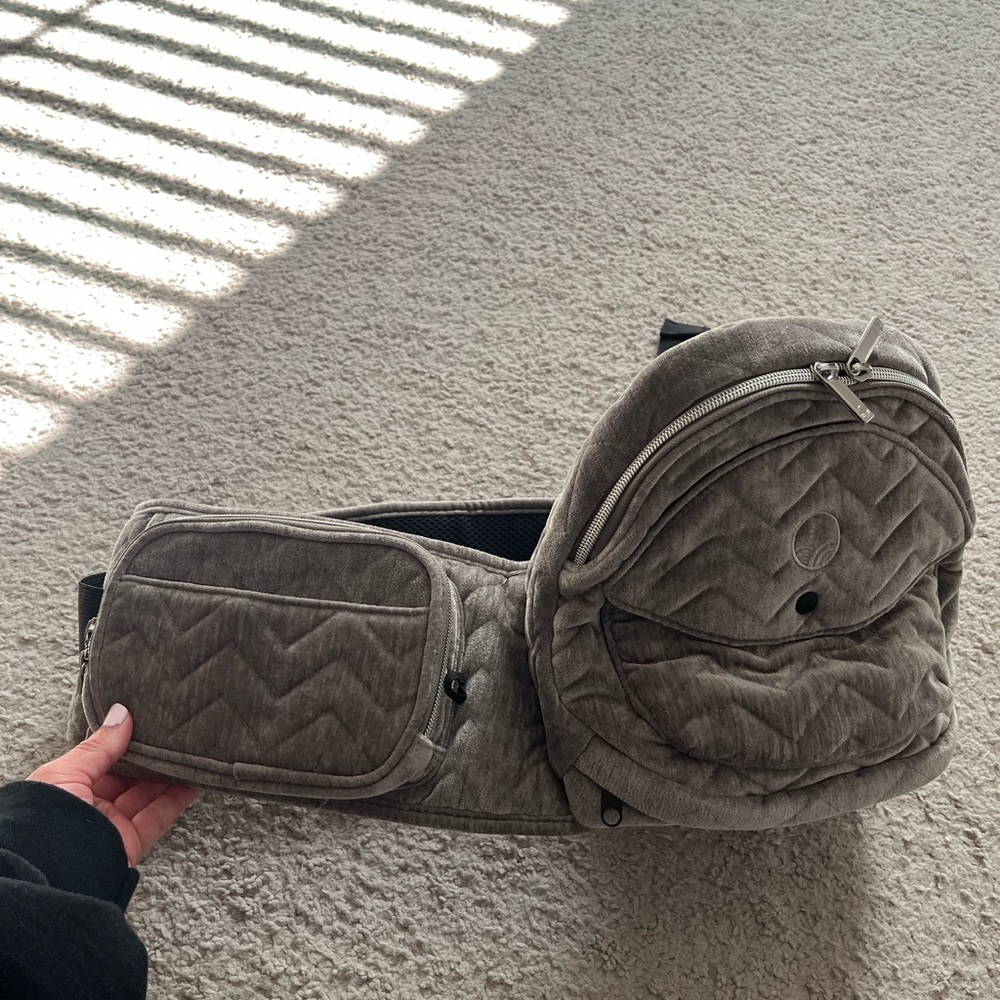 Tush baby hip carrier in gray velvet